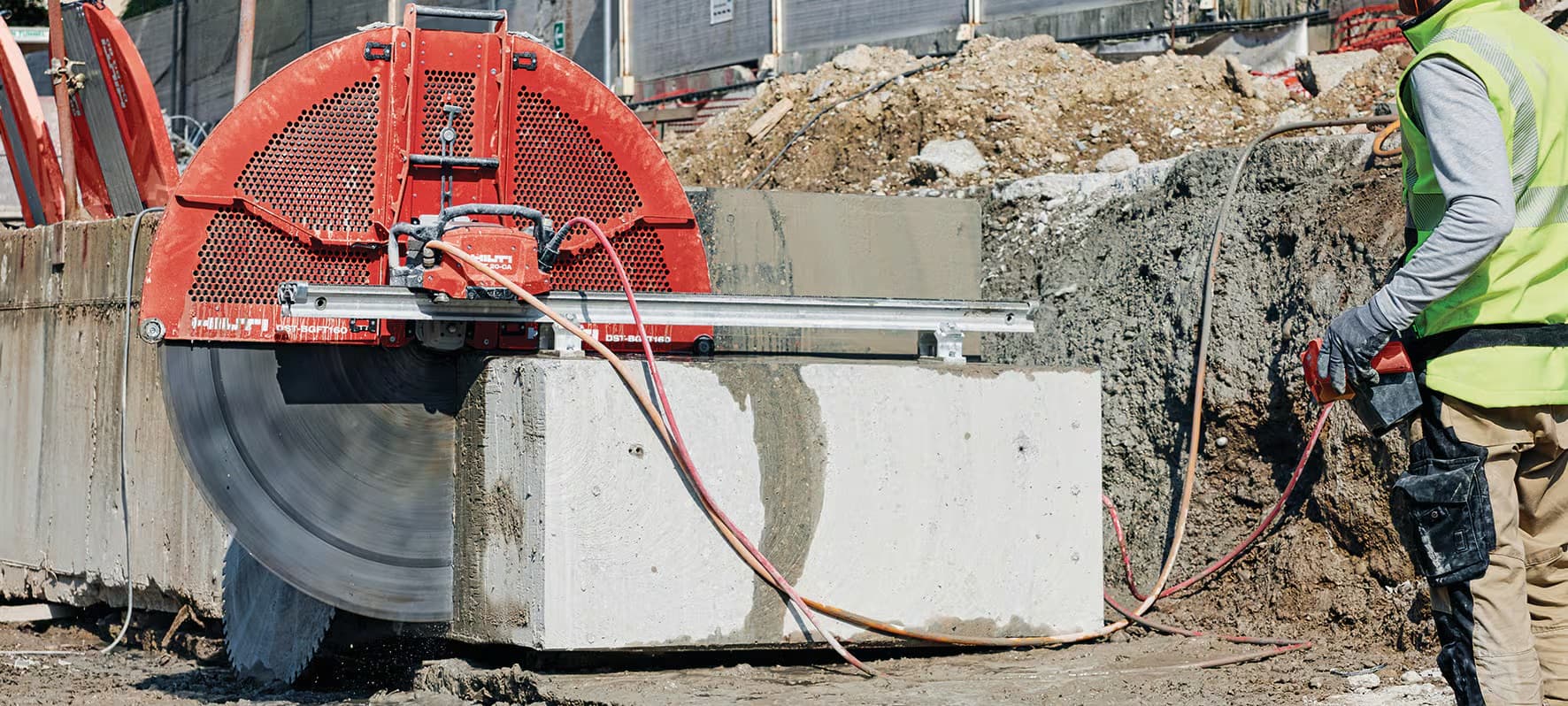 man cutting wall